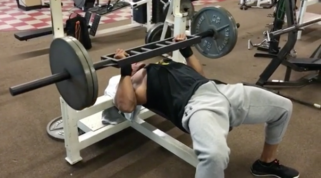 The Rock benching weights.