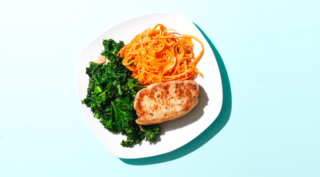 Sweet Potato Noodles With Garlic Kale and Pork Chops 
