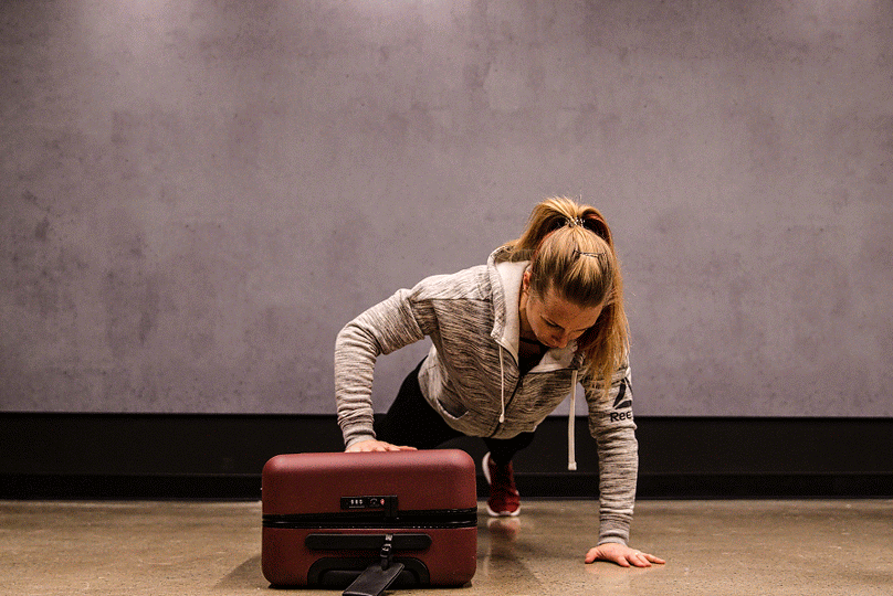 The Suitcase Workout to Keep You on Track While Traveling Muscle