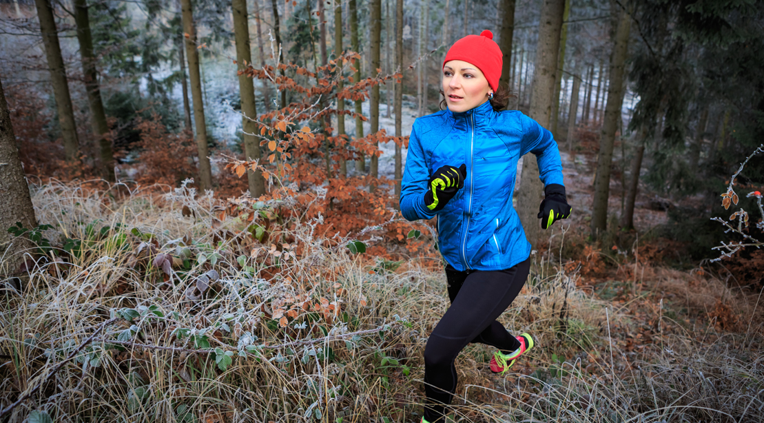 Woman Trail Running Outdoors