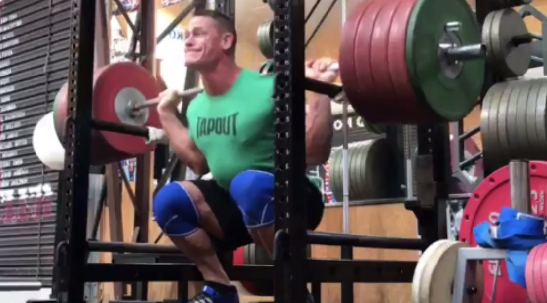 John Cena performing squat at gym