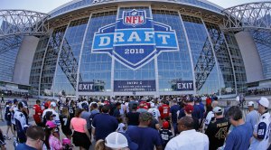 The doors open as a large crowd pours in the stadium before the second round of the NFL Draft at AT&T Stadium in Arlington, Texas, on Thursday, April 27, 2018.