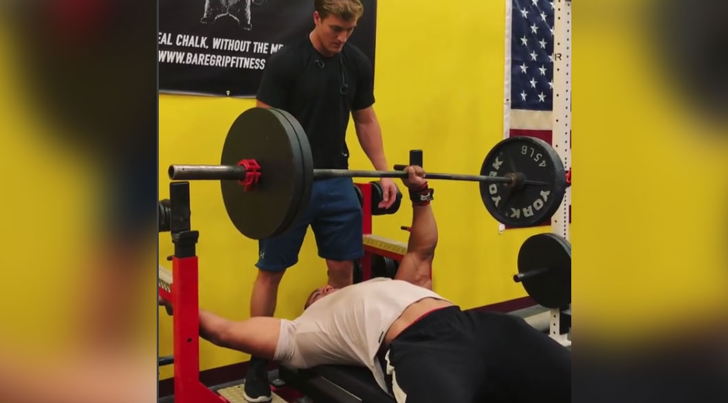 Here’s Larry Wheels Benching 225 Pounds With One Arm