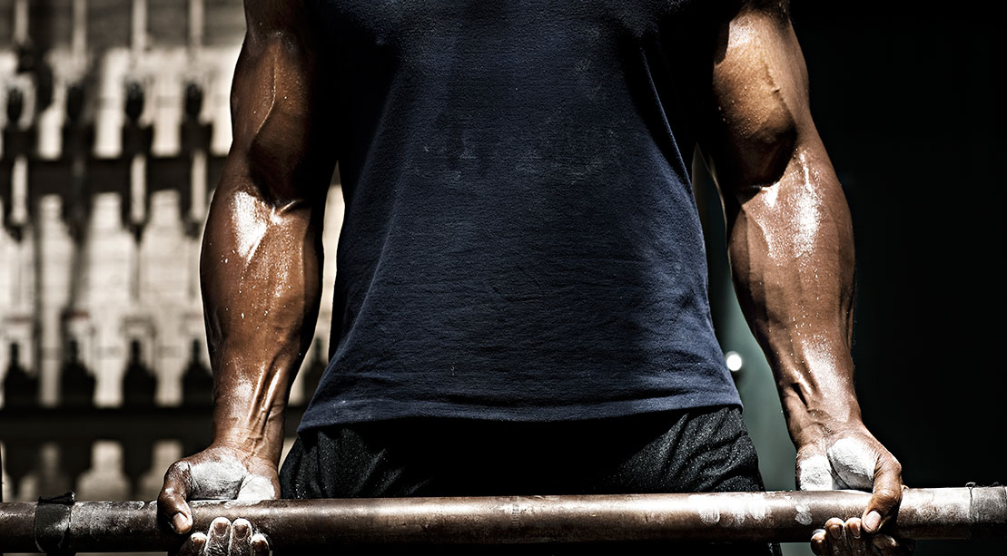 A man lifting weights. 