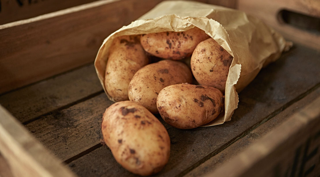 A bag full of healthy russet potato