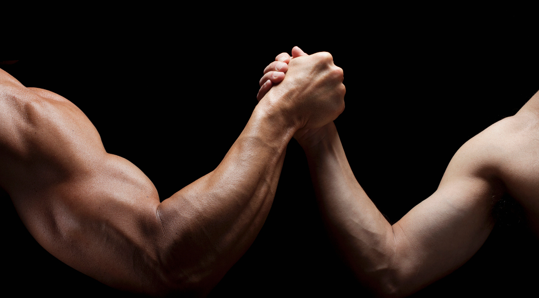 A picture of a man with a muscular arm and a man with a less-muscular arm.
