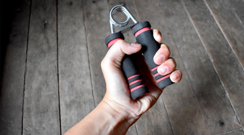 Hand-Exercising-Grip-Strength-With-A-Hand-Grip-