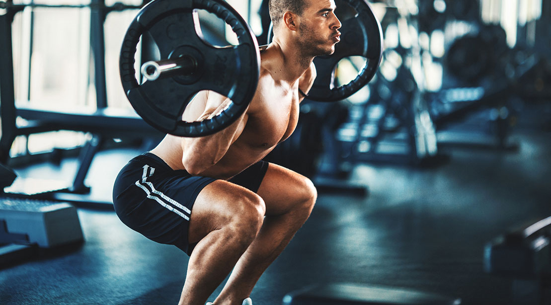 A picture of a person doing speed squats.
