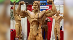 This Wooden Statue of Arnold Schwarzenegger Stole the Show at the 2019 Arnold