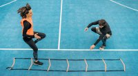 Man-Woman-Running-Agility-Ladder-Basketball-Court