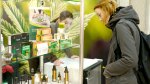 Young-Girl-Buying-CBD-Products-From-Hemp-Store