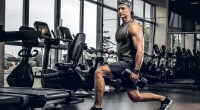 Young-Muscular-Man-Doing-Lunges-In-Dark-Gym