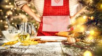 Female in an apron baking healthy holiday dessert recipes