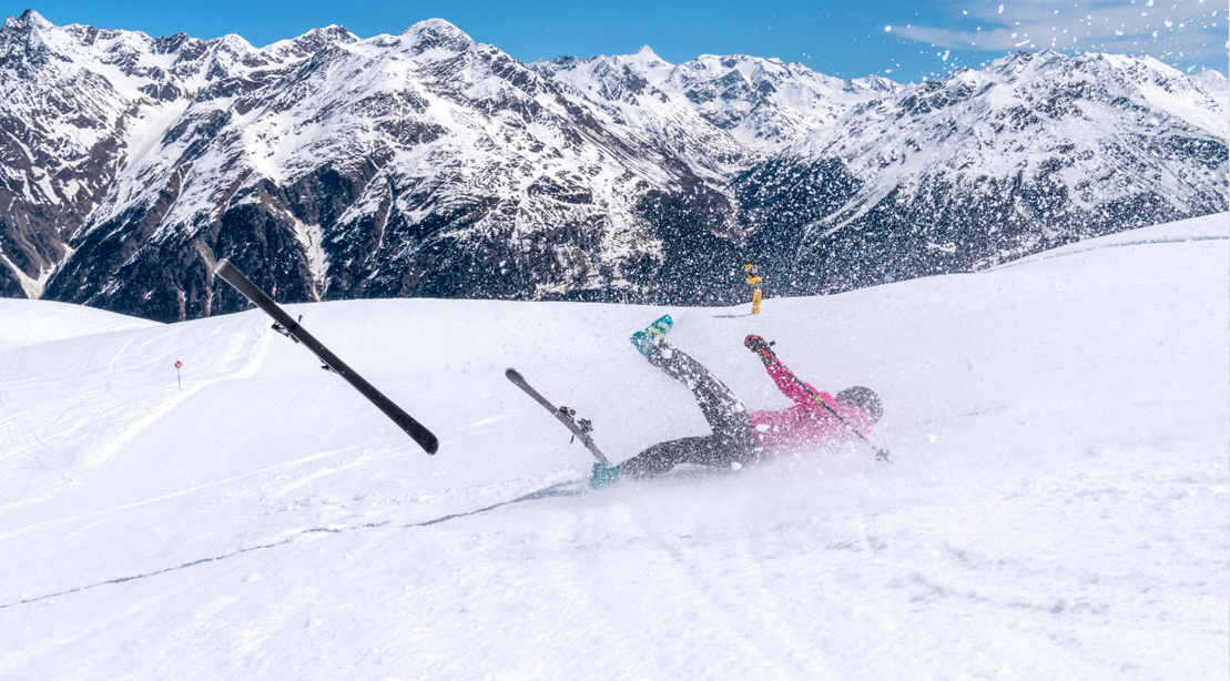 Girl-Falling-On-Ski-Skiis-Flying-in-Air.