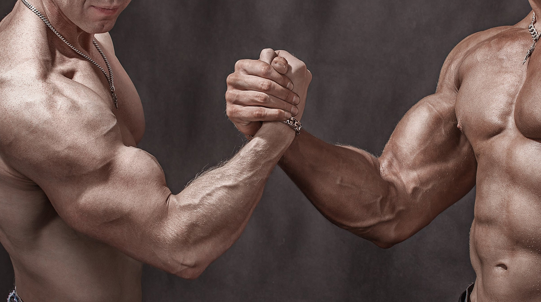 Two-Muscular-Males-Arm-Wrestling-Holding-Hands