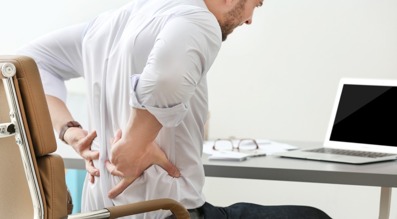 Man Working From Home Back Pain