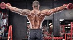 Fitness professional Simeon Panda demonstrating lateral raise exercises behind the back lateral dumbbell raise exercise