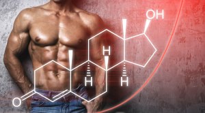 Muscular fit man standing behind an illustration of the chemical structure of testosterone