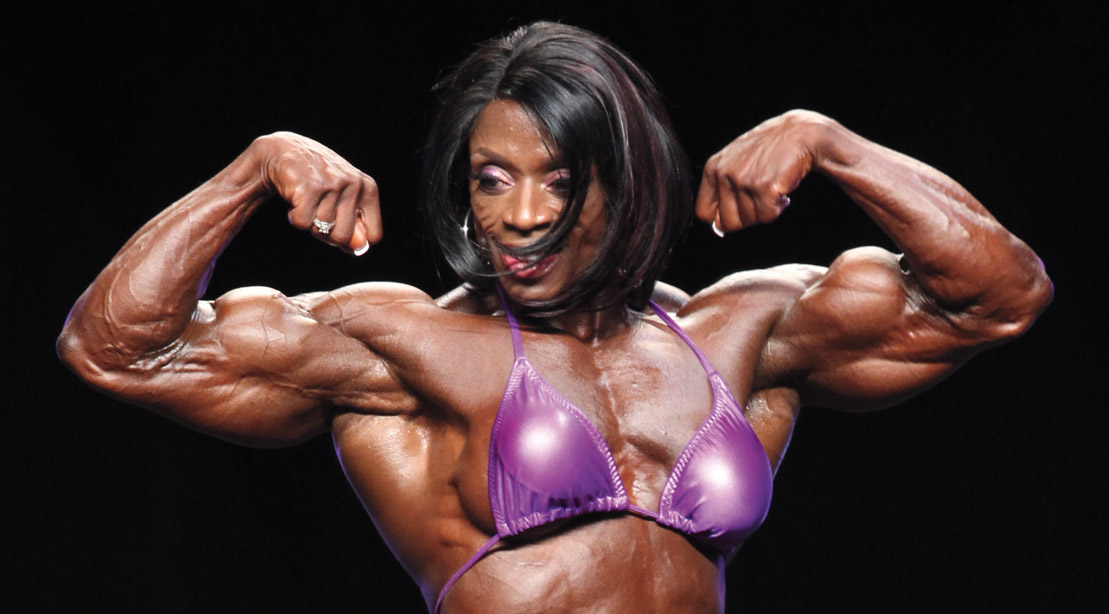 Female bodybuilder Iris kyle competing in a bodybuilding competition