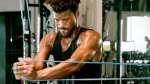 NBA basketball player Jimmy Butler working out during the pandemic with resistance bands