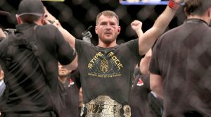 UFC fighter Stipe Miocic celebrating his victory over UFC contender Francis Ngannou