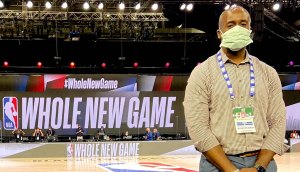 Orthopedic surgeon for the National Basketball Association Benedict Nwachukwu wearing a face mask inside a NBA basketball court and the NBA bubble,Walt Disney World Resort