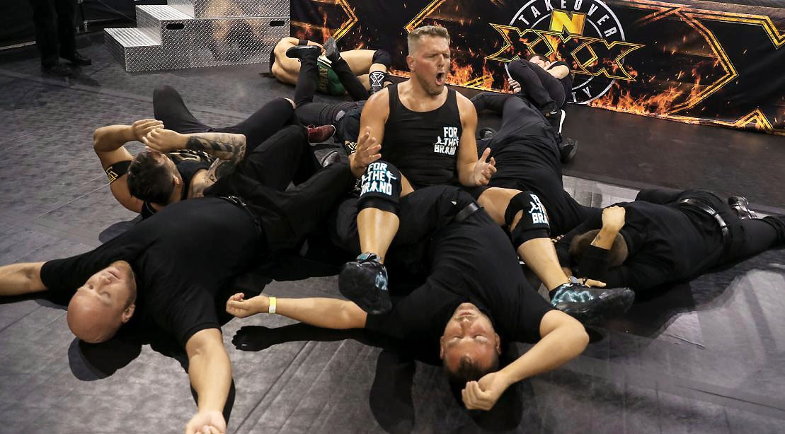 Pat Mcafee knocking dow wrestlers