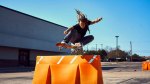 Pro-Skateboarder-Neen-Williams-Jumping-Over-Street-Partition