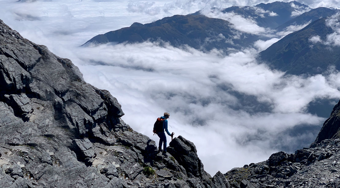 Mountaineer climbing down Mt. Everest alone