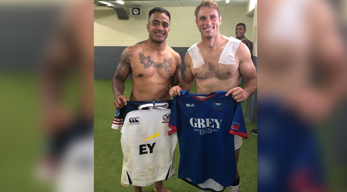 Rugby Player Blain Scully And Rey Lee Lo Holding Rugby Uniforms