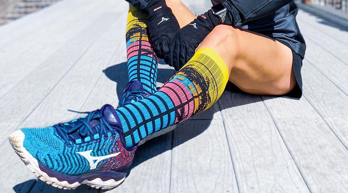 Female runner wearing compression socks