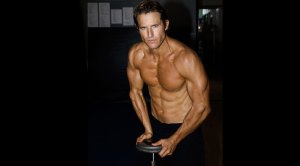 Fitness exper Andy McDermott advice on how to see your abs and get a six pack abs while leaning on a dumbbell