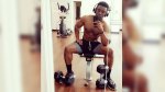 Chibuikem Uche working out with dumbbell exercises in the gym