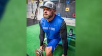 Chad Belding star of the Fowl Life performing a dumbbell split squat exercise