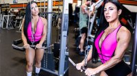 Female bodybuilder Gise Arenas working out in a pink bodysuit