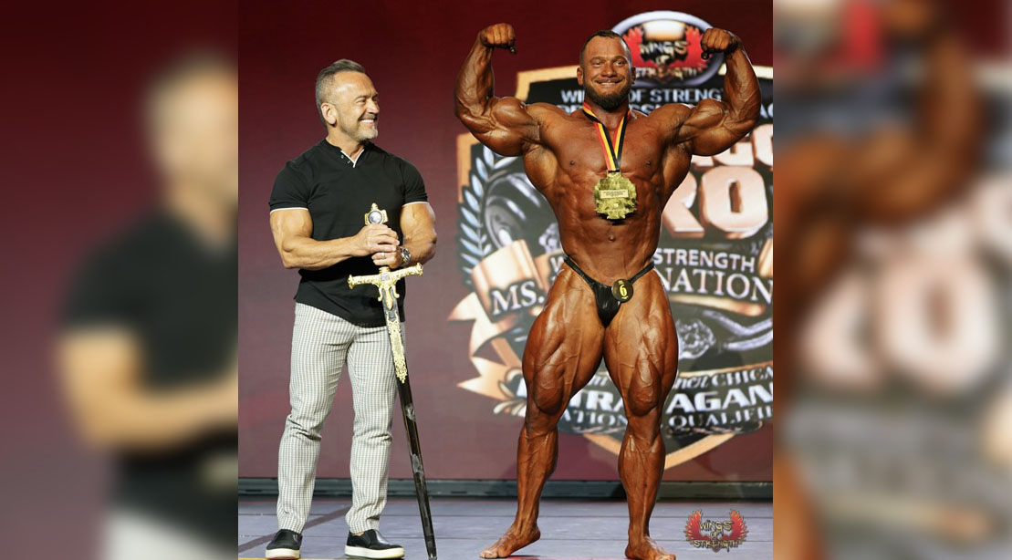 Father and Son bodybuilders Hunter Labrada and Lee Labrada on stage at a bodybuilding competition