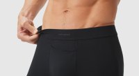 Man pulling on the waist band of the Jack Archer boxer brief