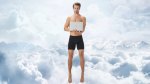 Man working on his laptop and floating in the sky while wearing jetsetter boxer brief