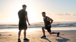 Celebrity Trainer Luke Zocchi training Christ Hemsworth on the beach with his10 minute bodyweight circuit workout