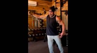 Don Saladino performing a Single Arm Cable Lateral Raise for his shoulder training day