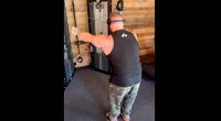 Jordan Shallow performing a rear delt cable volley for his shoulder training day with Frank Sepe and Don Saladino