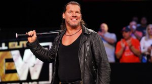 AEW wrestler Chris Jericho holding a bat in his wrestling performance