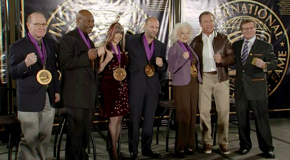 Inductees of Dr. Robert Goldman International Sports Hall of Fame including Arnold Schwarzenegger Evander Holyfield and others