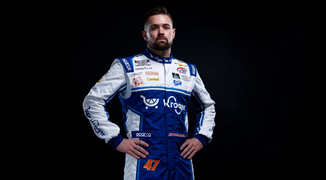 Nascar athlete and racer Ricky Stenhouse wearing his racing uniform and firesuit