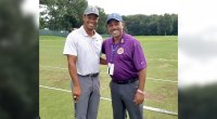 Charles Eggleston playing golf with Tiger Woods