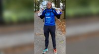 Chief Medical Diversity Officer for the Hospital for Special Surgery (HSS) Dr. Stephen Haskins finishing a marathon after running the NYC Marathon