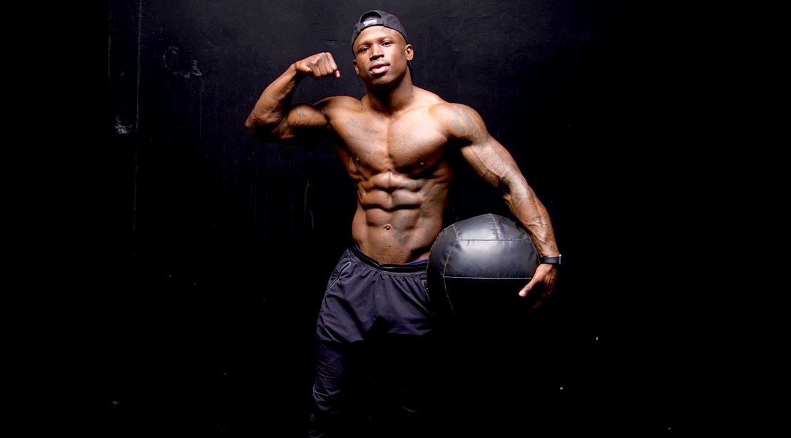 Darien Johnson showing his muscular physique and six pack abs