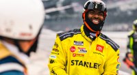 Derrell Edwards in his nascar pit crew uniform on the race track