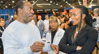 Lee Haney talking with former Ms. Olympia Lenda Murray