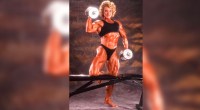 Muscular woman Bev Francis performing a dumbbell workout